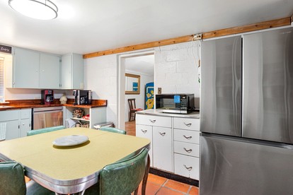 Riverbank Escape for Families and Friends with Ping Pong, Mrs. Pac-Man, and Cozy Den in Kerrville, Texas - Kerrville, Texas - glamping.directory