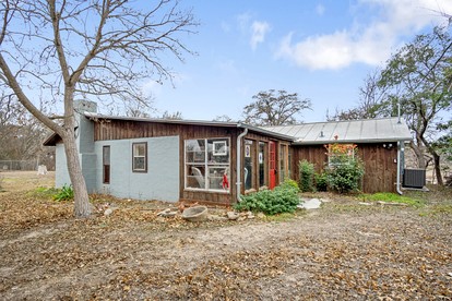 Riverbank Escape for Families and Friends with Ping Pong, Mrs. Pac-Man, and Cozy Den in Kerrville, Texas - glamping.directory