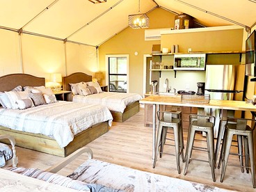 Cibolo's Family Oasis: Waterfront Tented Cabin Fully Loaded for Your Perfect Getaway - Cibolo, Texas - glamping.directory