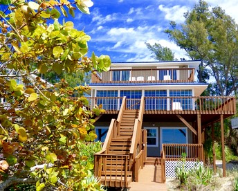 Secluded Beachfront Vacation Home with Private Boardwalk on Little Gasparilla Island near Boca Grande, Florida - glamping.directory