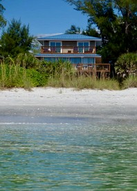 Secluded Beachfront Vacation Home with Private Boardwalk on Little Gasparilla Island near Boca Grande, Florida - Placida, Florida - glamping.directory
