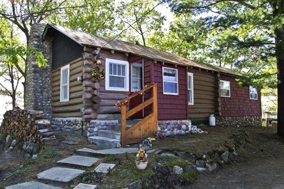 Fascinating Cabin with Foosball and Air Hockey Table in Carp Lake, Michigan - glamping.directory