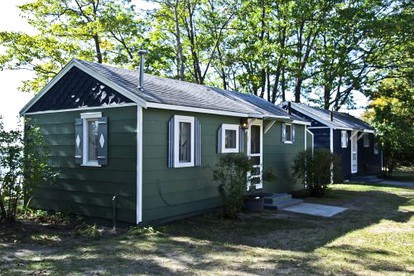 Fascinating Cabin with Foosball and Air Hockey Table in Carp Lake, Michigan - Carp Lake, Michigan - glamping.directory