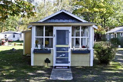 Fascinating Cabin with Foosball and Air Hockey Table in Carp Lake, Michigan - Carp Lake, Michigan - glamping.directory