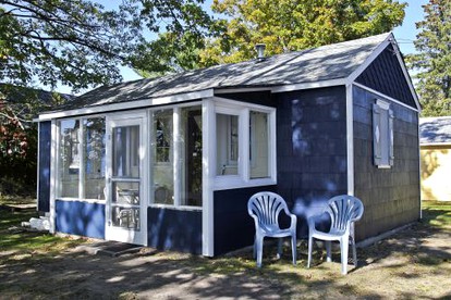 Fascinating Cabin with Foosball and Air Hockey Table in Carp Lake, Michigan - Carp Lake, Michigan - glamping.directory