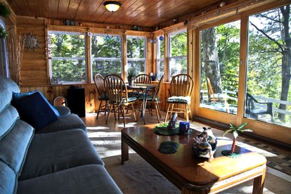 Fascinating Cabin with Foosball and Air Hockey Table in Carp Lake, Michigan - Carp Lake, Michigan - glamping.directory