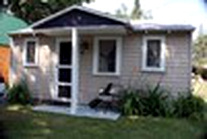 Fascinating Cabin with Foosball and Air Hockey Table in Carp Lake, Michigan - Carp Lake, Michigan - glamping.directory