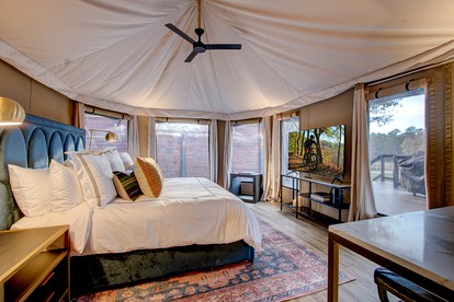 Hot Springs Retreat: Luxe Tented Cabin with Waterfront Views and Hot Tub - Hot Springs, Arkansas - glamping.directory