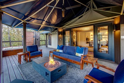 Hot Springs Retreat: Luxe Tented Cabin with Waterfront Views and Hot Tub - Hot Springs, Arkansas - glamping.directory