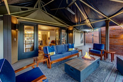 Hot Springs Retreat: Luxe Tented Cabin with Waterfront Views and Hot Tub - Hot Springs, Arkansas - glamping.directory