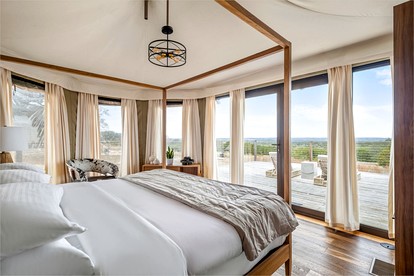 Beautiful Safari Tent with Deck Incredible for a Romantic Getaway in Texas - Stonewall, Texas - glamping.directory