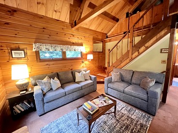 Fantastic Lakefront Wooden Cabin Settled Between Trees in Stratton, Vermont - Stratton, Vermont - glamping.directory