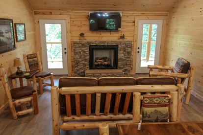 Great Smoky Mountain Glamping Getaway in this Lovely Cabin Rental with Hot Tub in Gatlinburg - Gatlinburg, Tennessee - glamping.directory