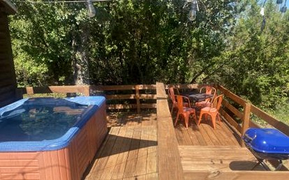 Cozy Texas Cabin Retreat with Hot Tub & Scenic Outdoor Spaces in Bluff Dale, Texas - Bluff Dale, Texas - glamping.directory
