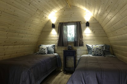 Luxurious White Pine Pod for Two Nestled in the Woods for an Unforgettable Glamping Getaway by Lake Superior in Wisconsin - Washburn, Wisconsin - glamping.directory
