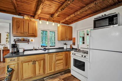 Secluded Cabin Nestled Amidst Trees and Fire Pit Provided in Hazelhurst, Wisconsin - Hazelhurst, Wisconsin - glamping.directory