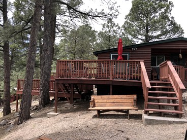 Rustic Family Cabin with a Luxurious Hot Tub in Ruidoso, New Mexico - glamping.directory