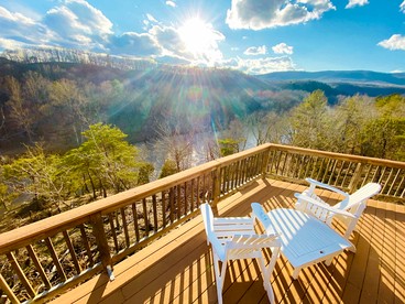 Secluded, Solar Powered Log Cabin on the Great Cacapon River, Perfect for Large Group Getaways to the West Virginia Wilderness - glamping.directory