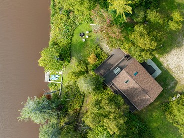 Riverfront Cabin Incredible for Outdoor Enthusiasts with Kayaks in Hessel, Michigan - Hessel, Michigan - glamping.directory