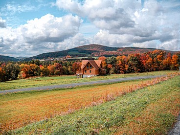 Expansive Getaway Designed for Gatherings with Game Room & Scenic Decks in Stamford, New York - Stamford, New York - glamping.directory