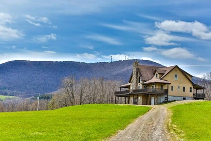 Expansive Getaway Designed for Gatherings with Game Room & Scenic Decks in Stamford, New York - Stamford, New York - glamping.directory