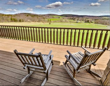 Expansive Getaway Designed for Gatherings with Game Room & Scenic Decks in Stamford, New York - Stamford, New York - glamping.directory