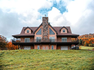 Expansive Getaway Designed for Gatherings with Game Room & Scenic Decks in Stamford, New York - glamping.directory