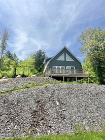 Beautiful Modern Cottage with Stunning Natural Views in Sebago, Maine - glamping.directory