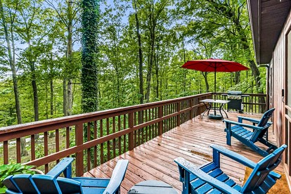 Private River Cabin with Hot Tub, Fire Pit, Screened Porch Loaded with Kayaks and Fun Games - Perfect for Your Great Cacapon, WV Adventure - Great Cacapon, West Virginia - glamping.directory