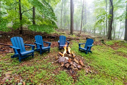 Private River Cabin with Hot Tub, Fire Pit, Screened Porch Loaded with Kayaks and Fun Games - Perfect for Your Great Cacapon, WV Adventure - Great Cacapon, West Virginia - glamping.directory