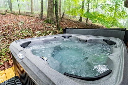 Private River Cabin with Hot Tub, Fire Pit, Screened Porch Loaded with Kayaks and Fun Games - Perfect for Your Great Cacapon, WV Adventure - Great Cacapon, West Virginia - glamping.directory