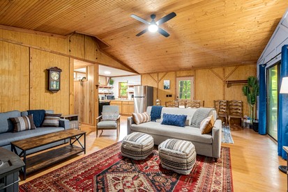 Private River Cabin with Hot Tub, Fire Pit, Screened Porch Loaded with Kayaks and Fun Games - Perfect for Your Great Cacapon, WV Adventure - Great Cacapon, West Virginia - glamping.directory