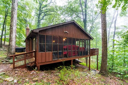 Private River Cabin with Hot Tub, Fire Pit, Screened Porch Loaded with Kayaks and Fun Games - Perfect for Your Great Cacapon, WV Adventure - glamping.directory