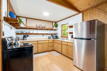 Private River Cabin with Hot Tub, Fire Pit, Screened Porch Loaded with Kayaks and Fun Games - Perfect for Your Great Cacapon, WV Adventure - Great Cacapon, West Virginia - glamping.directory
