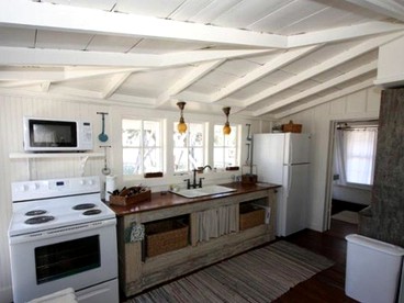 Secluded Cottage Rental Overlooking the Guadalupe River in Center Point, Texas - Center Point, Texas - glamping.directory