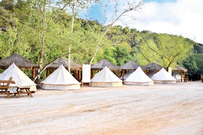Dream Family Glamping Getaway near New Braunfels, Texas: Charming Bell Tent Rental on the Guadalupe River - Kingsbury, Texas - glamping.directory