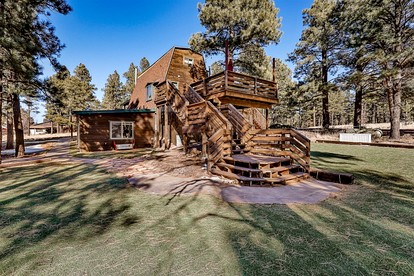 Large and Unique Cabin with a Private Hot Tub and Fire Pit with View of Mt. Eldon - glamping.directory