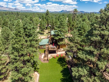 Large and Unique Cabin with a Private Hot Tub and Fire Pit with View of Mt. Eldon - Flagstaff, Arizona - glamping.directory