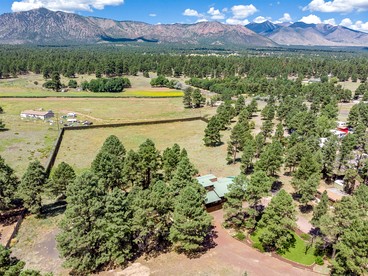 Large and Unique Cabin with a Private Hot Tub and Fire Pit with View of Mt. Eldon - Flagstaff, Arizona - glamping.directory