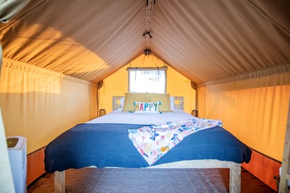 Comfortable Glamping Tent with Fire Pit and Stream Access Near Mark Twain National Forest in Missouri - Cassville, Missouri - glamping.directory