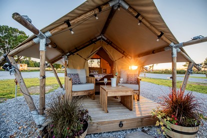 Comfortable Glamping Tent with Fire Pit and Stream Access Near Mark Twain National Forest in Missouri - Cassville, Missouri - glamping.directory