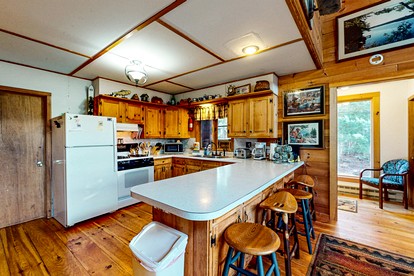 Pet-Friendly Cabin with Deck and Serene Lake Views in Maine - Greenville, Maine - glamping.directory