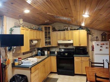 Cozy Riverside Cabin Rental with Fishing Access on Wolf River, Wisconsin - Fremont, Wisconsin - glamping.directory