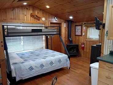 Cozy Riverside Cabin Rental with Fishing Access on Wolf River, Wisconsin - Fremont, Wisconsin - glamping.directory