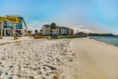 Impressive Oceanfront Beach House with Stunning Vistas in Navarre, Florida - glamping.directory