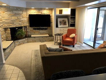 Secluded Woodland Retreat Home with Creekside Deck Near Macatawa Beach in Macatawa, Michigan - Macatawa, Michigan - glamping.directory