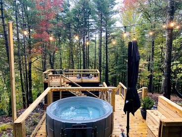 Tiny Luxe Living: Todd, NC Retreat with Hot Tub and Breathtaking Deck Views - Todd, North Carolina - glamping.directory
