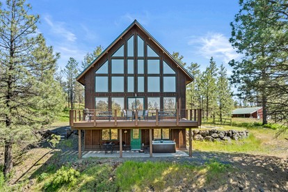 Spacious Rustic Cabin Rental with a Hot Tub in Cheney, Washington - glamping.directory