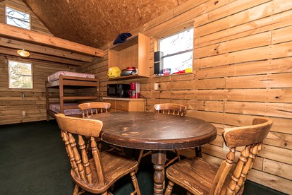 Cozy Rustic Cabin Rental on Private Ranch for Weekend Getaway from Austin - Red Rock, Texas - glamping.directory