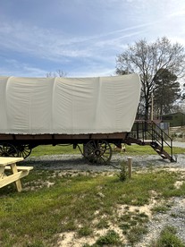 Go Glamping in North Carolina at this Wonderful Riverside Covered Wagon in Lillington - Lillington, North Carolina - glamping.directory